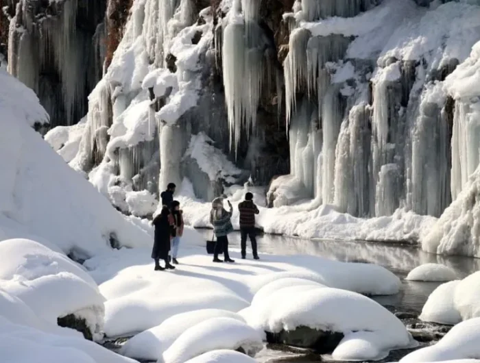 a hidden place frozen waterfall in kashmir mus include place for kashmir tour packages.